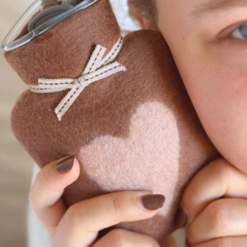 Hot water bottles in merino wool felt by dorothee lehnen