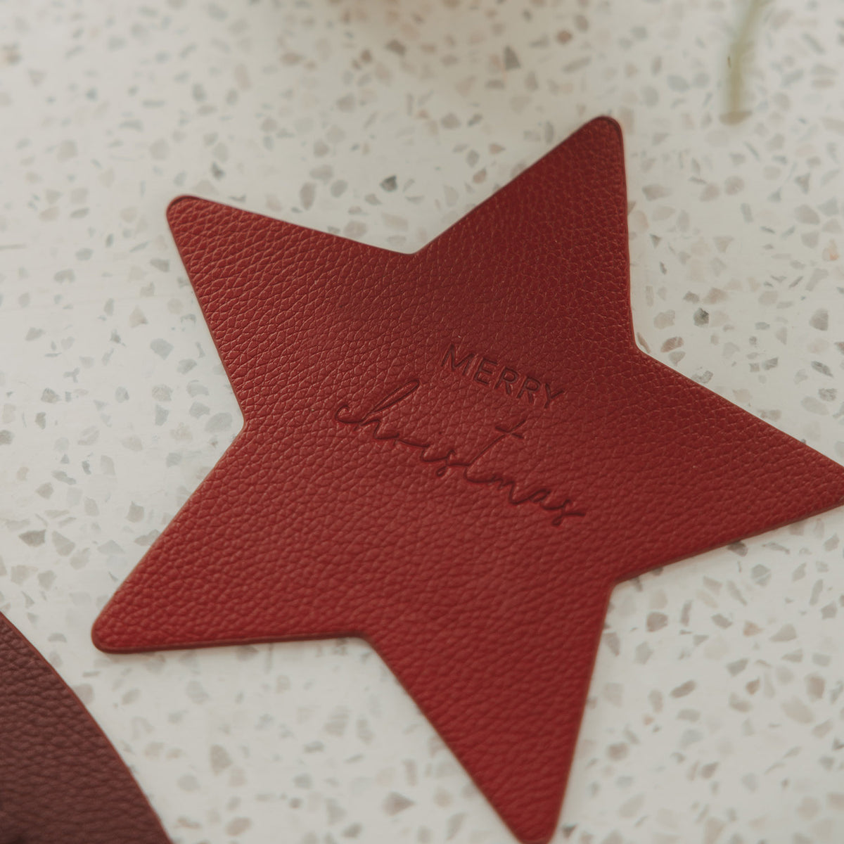 Sottobicchieri a forma di stella "Merry Christmas" set da 2 rosso - Eulenschnitt