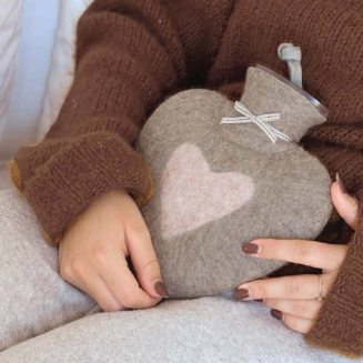 Hot water bottles in merino wool felt by dorothee lehnen