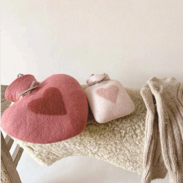 Hot water bottles in merino wool felt by dorothee lehnen