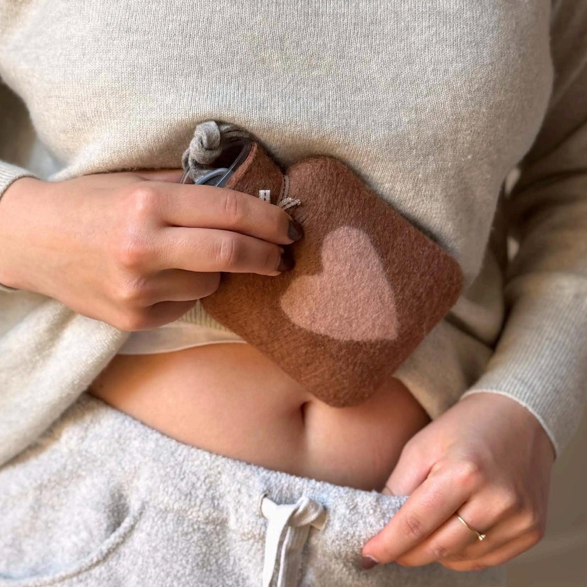 Hot water bottles in merino wool felt by dorothee lehnen