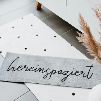 Doormat with text "hereinspaziert" gray 75x25cm – washable - Eulenschnitt - Article Picture 1